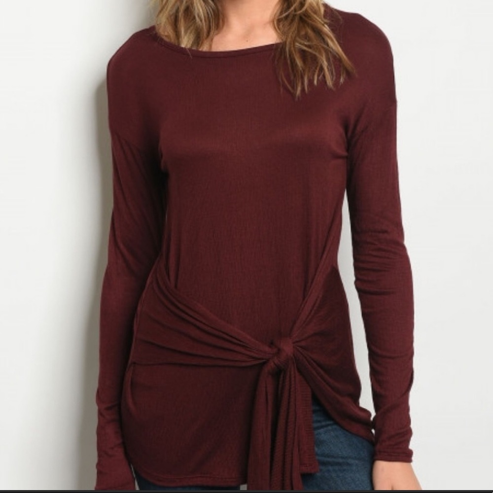 Tie front long sleeve top.